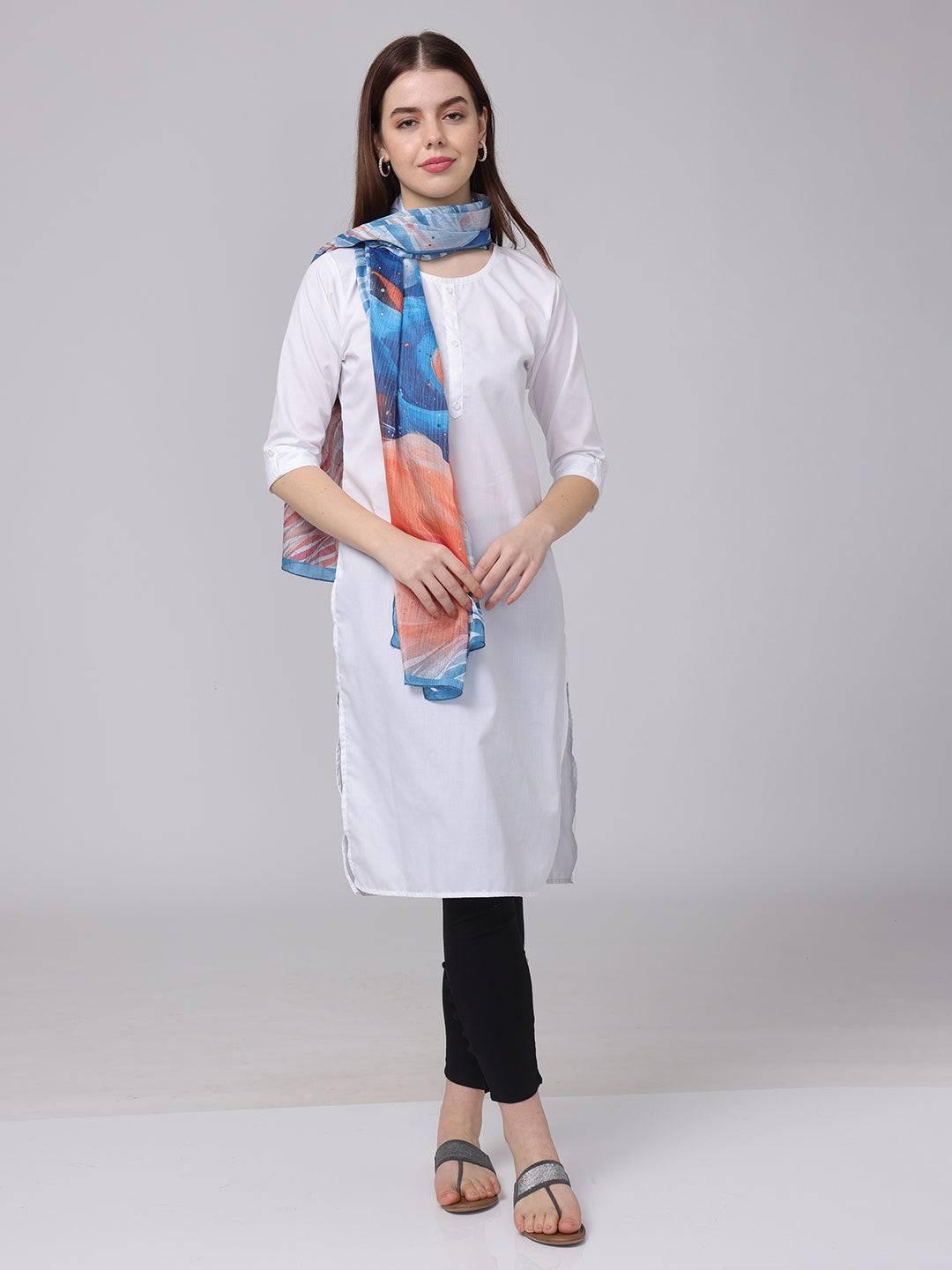 Model wearing vibrant abstract patterned scarf