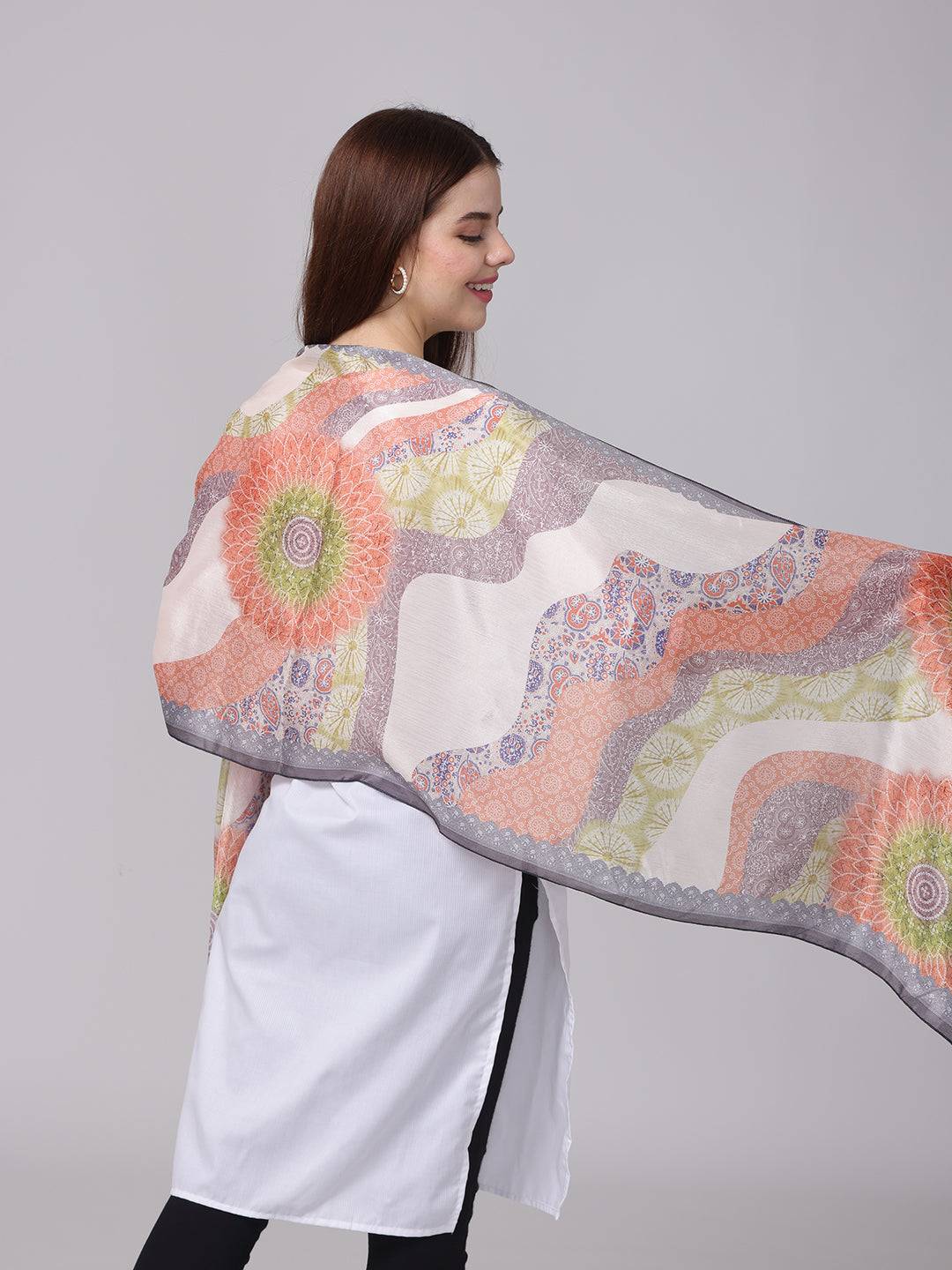 Side view of Vibrant Paisley Print Scarf on model