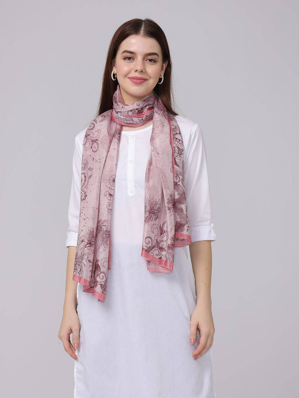 Crepe pink floral printed scarf worn with white outfit