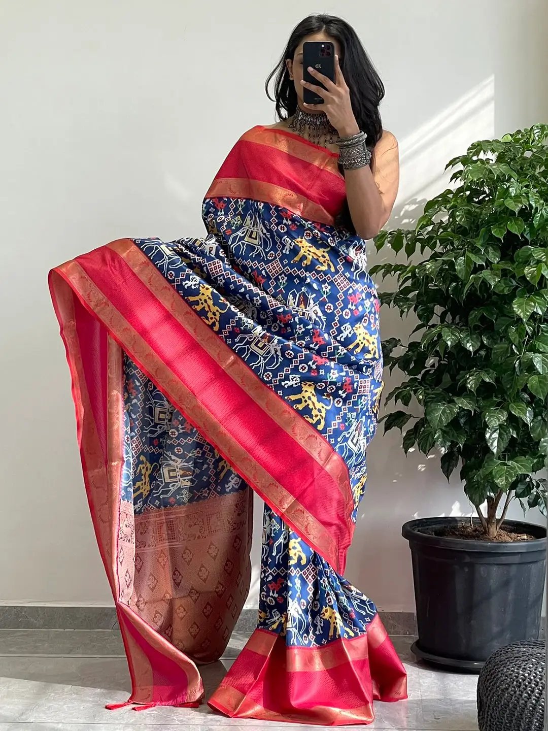 Soft Silk Gadwal Border Pochampally Print Saree draped elegantly.