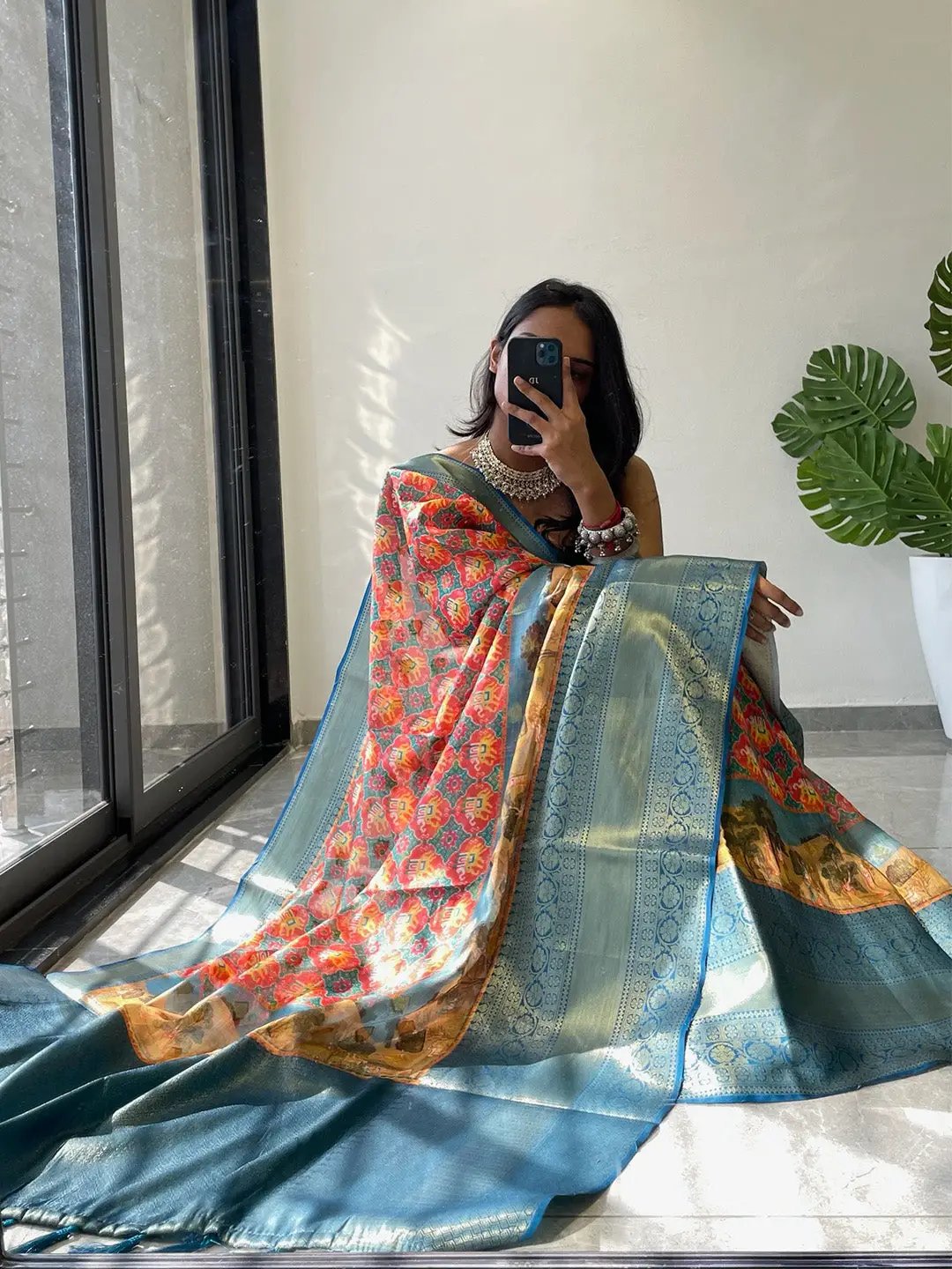 Model showcasing Moonga silk Kota Doriya saree in natural light