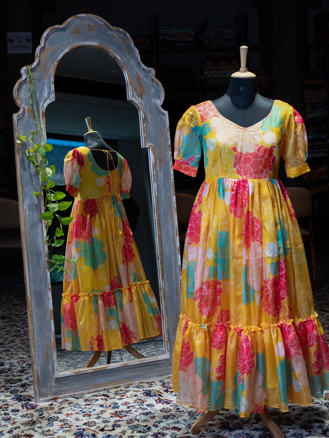 Daylily Yellow V Neck Midi Dress on mannequin with mirror