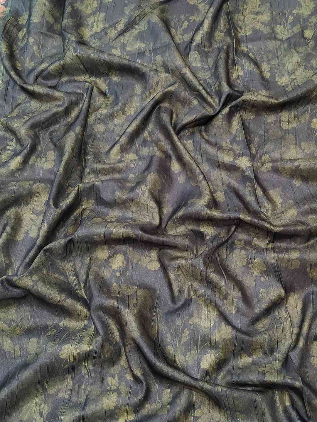 Textured fabric of pista silk saree with floral design