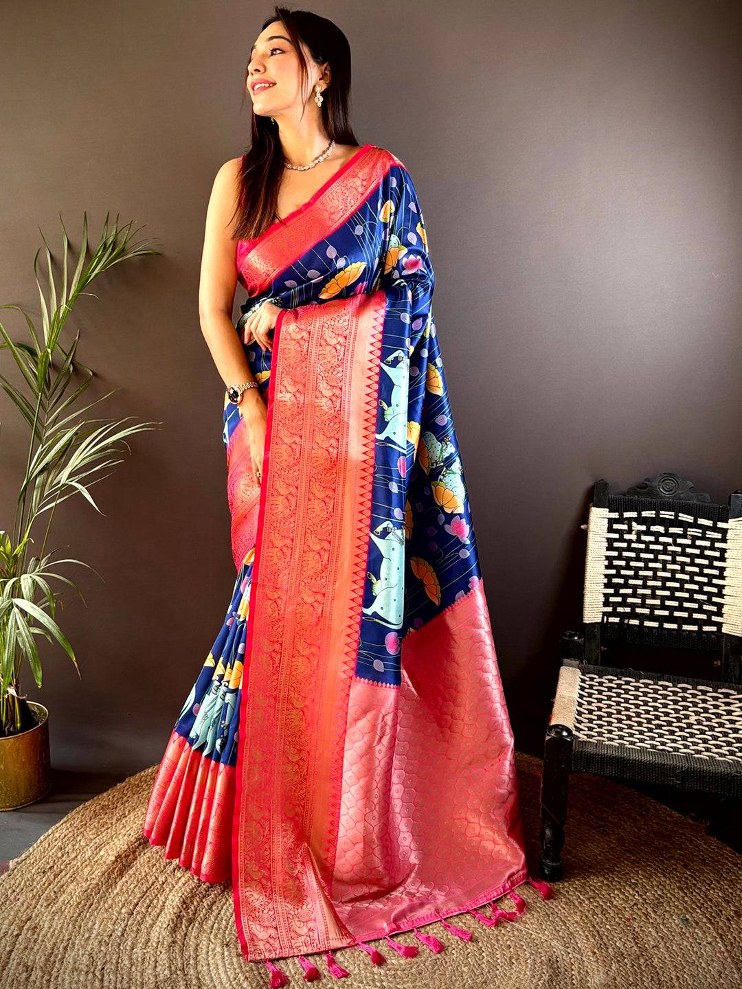 Elegant navy blue silk saree with Pichwai Kalamkari and pink zari border
