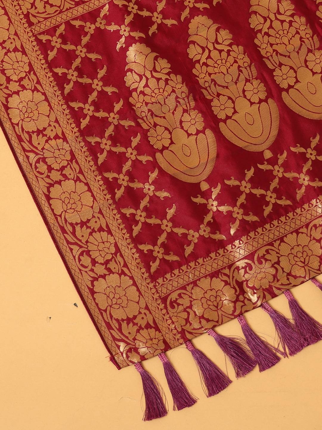 Close-up of woven design on silk blend dupatta with tassels