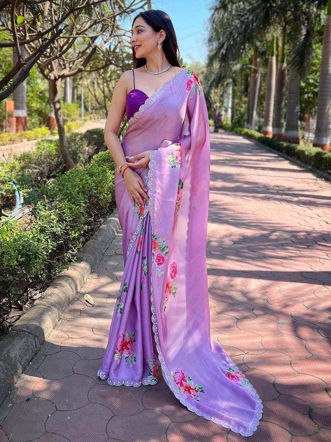 Elegant floral satin georgette saree with zircon Swarovski border