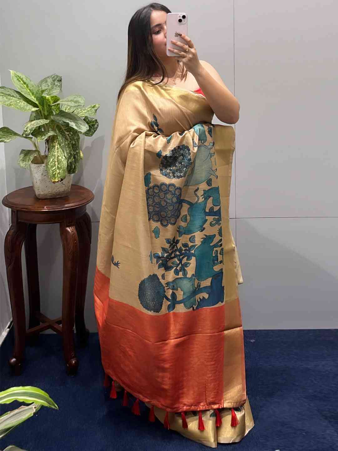 Beautiful Kalamkari linen tissue saree showcasing detailed artwork.