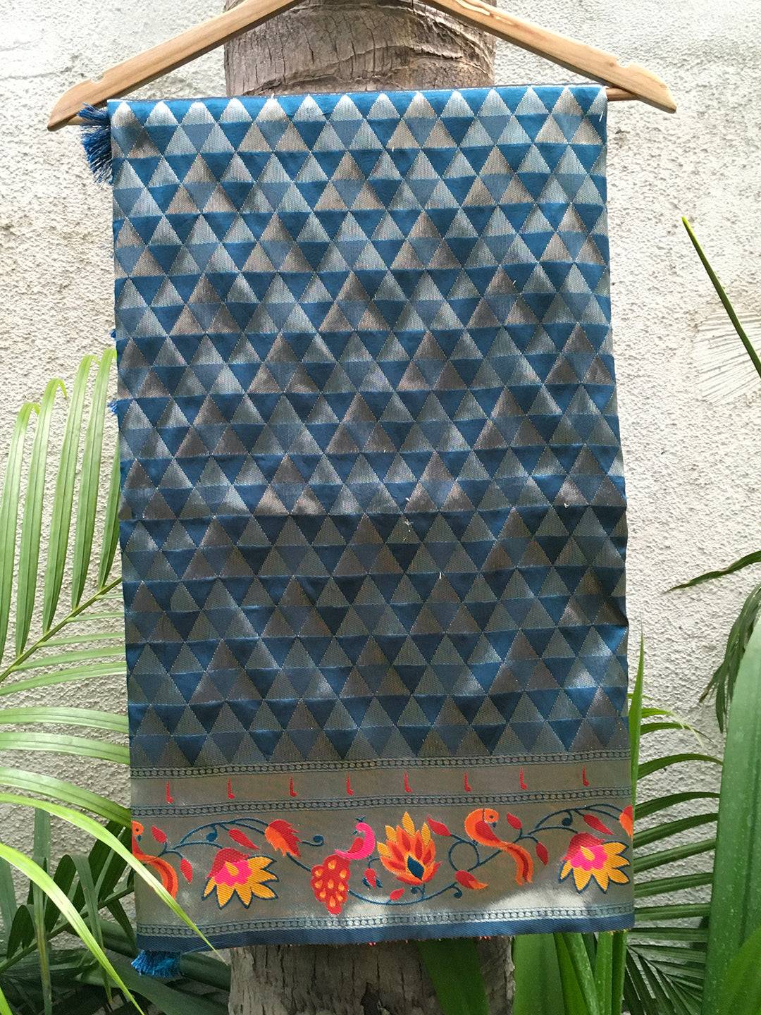 Denim silk blend saree fabric with geometric and floral patterns