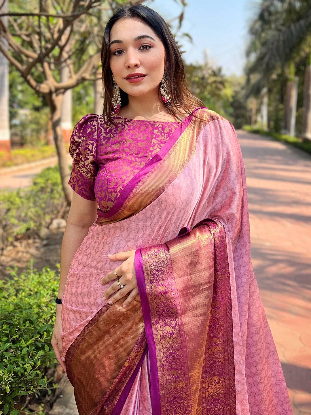 Pink Kanjivaram silk saree with brocade zari blouse outdoors