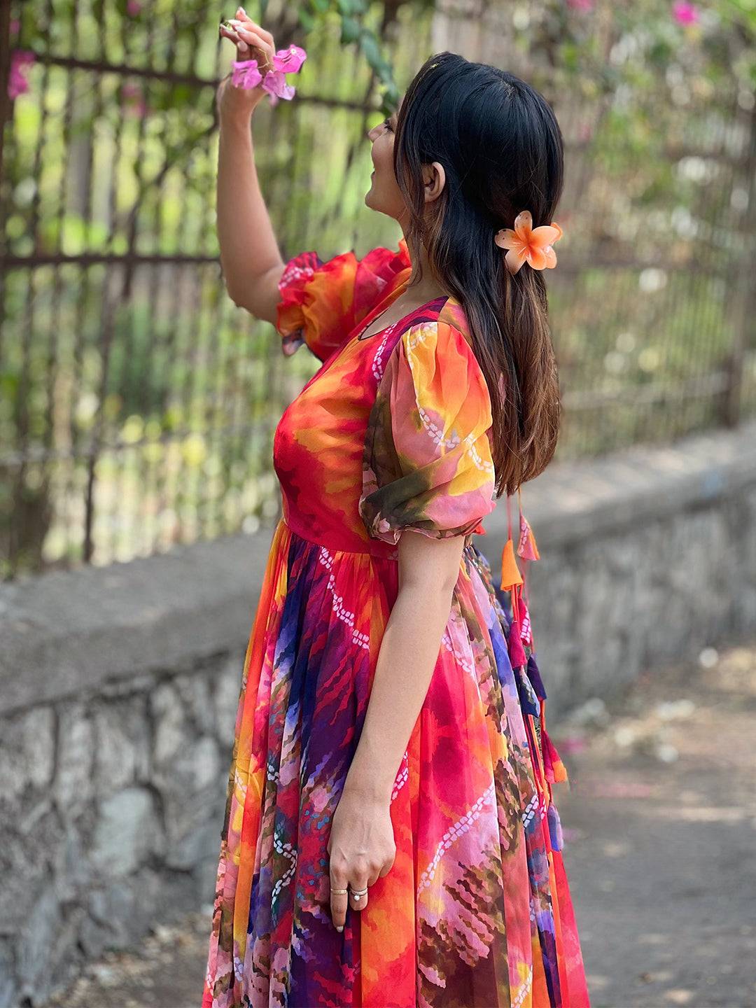 Back view of multi batik bandhej dress with floral detail