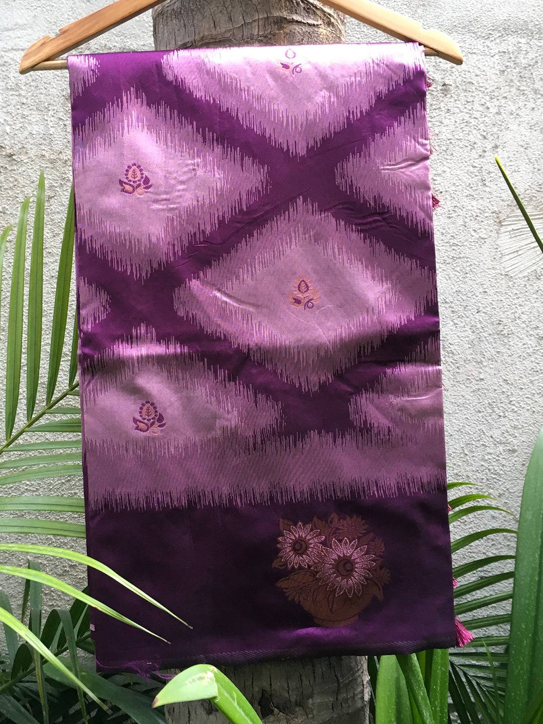 Lavender Tussar Silk Saree fabric with Ikkat pattern on display