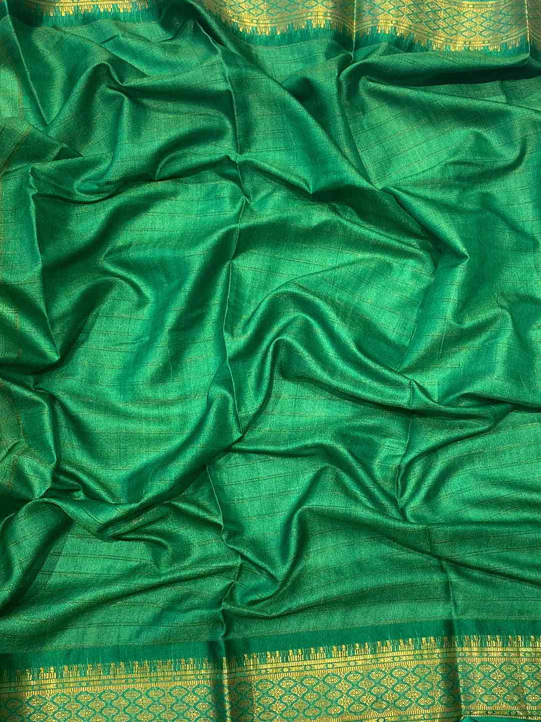 Green Uppada silk saree fabric with intricate border
