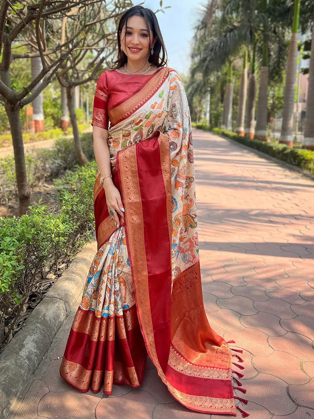 Maroon Banarasi silk saree with intricate double border design