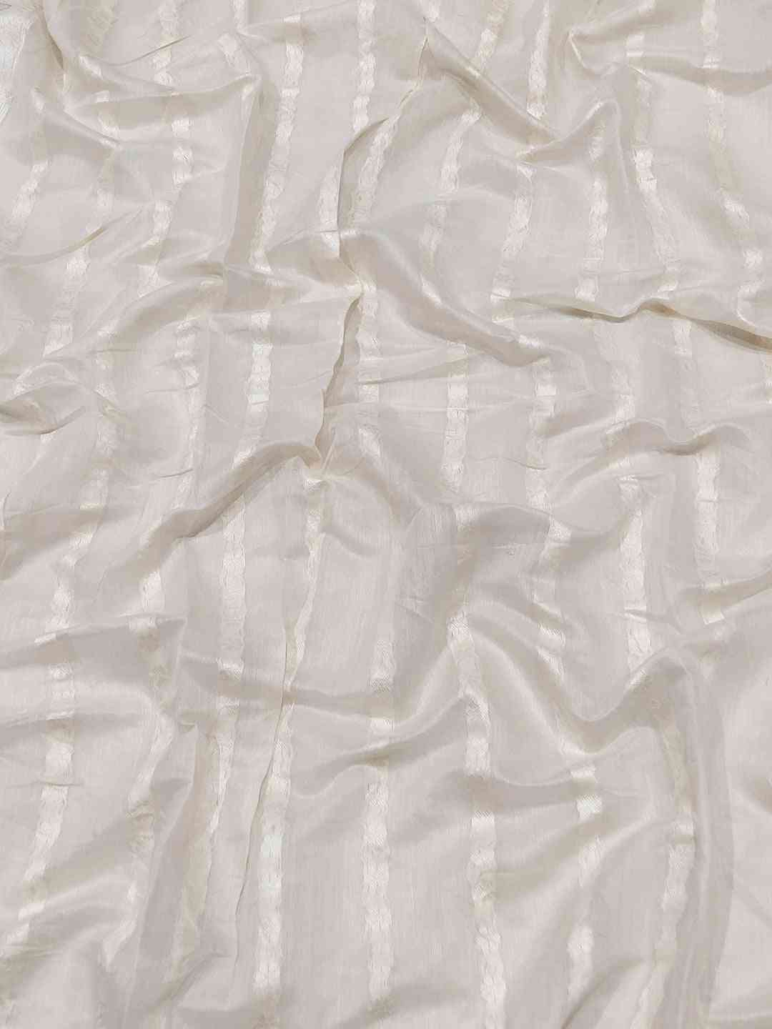 Close-up of white fabric with subtle stripe texture