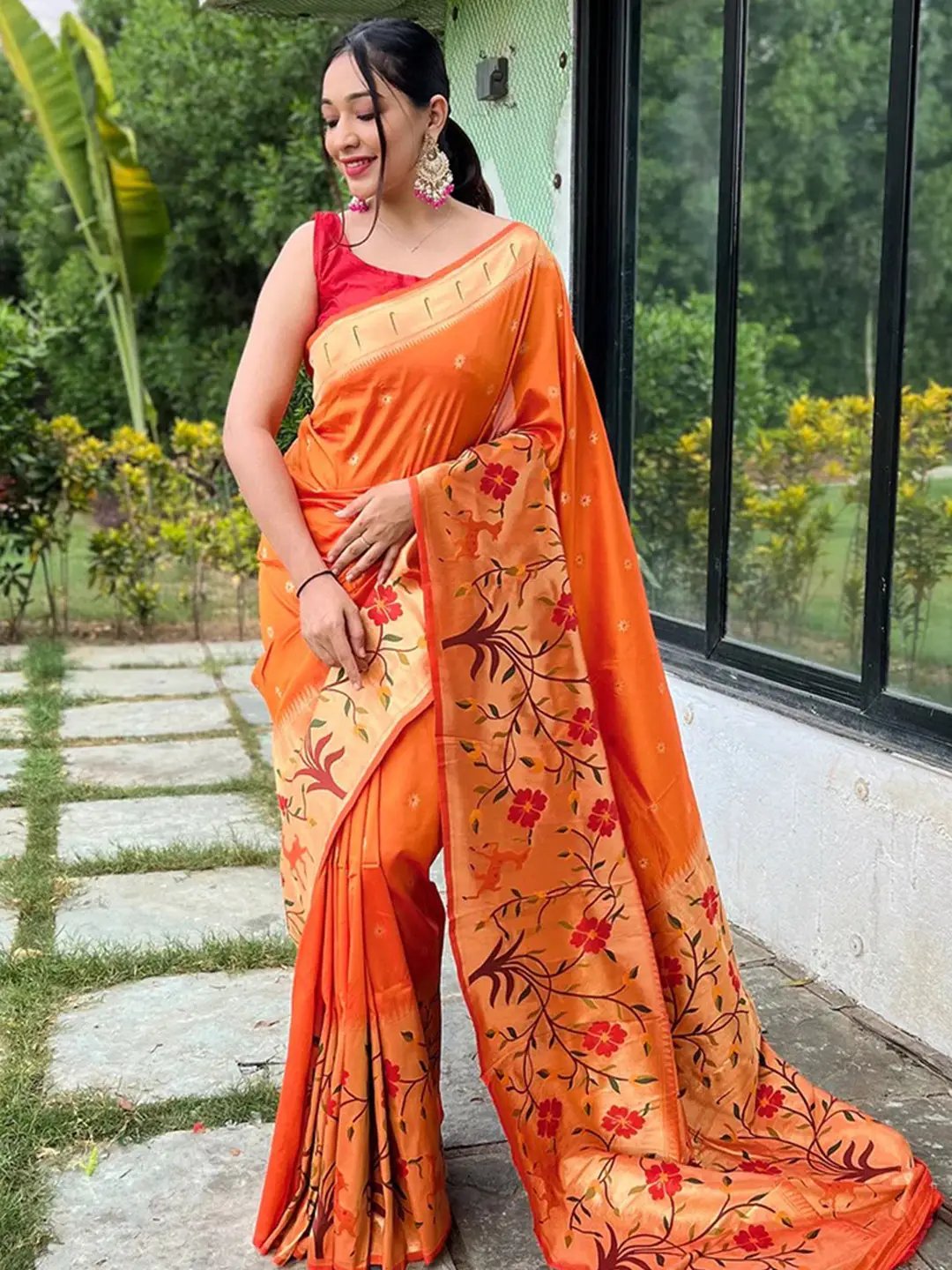 Orange Paithani saree with big border and floral design