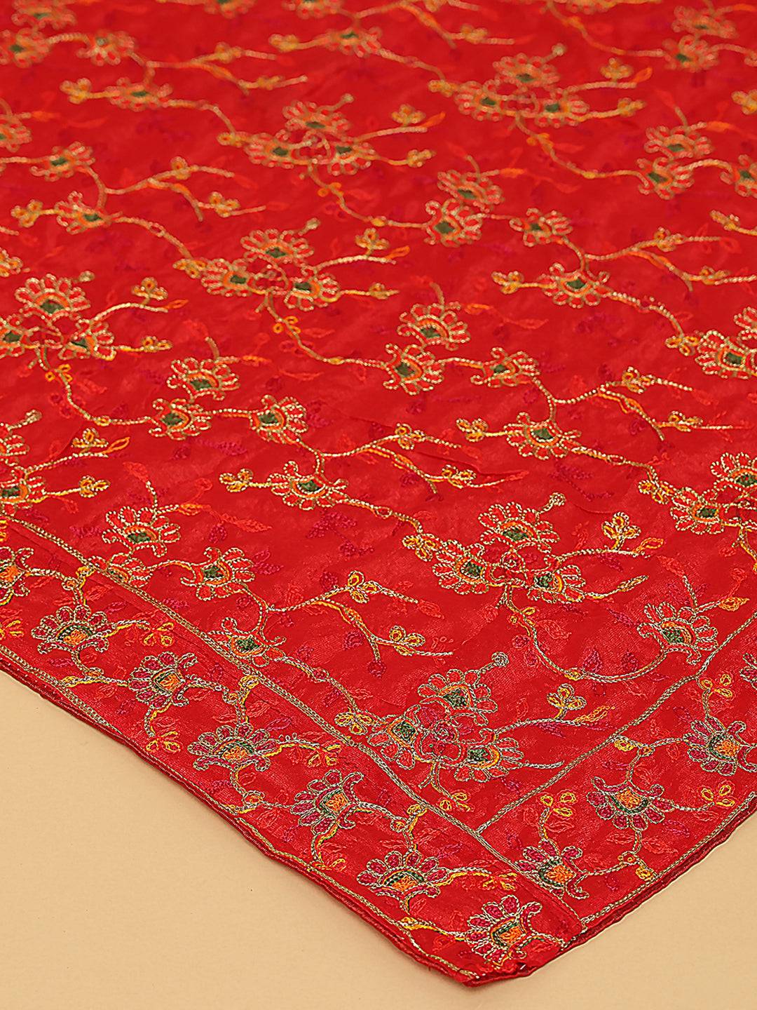 Close-up of red pashmina dupatta with detailed thread embroidery.