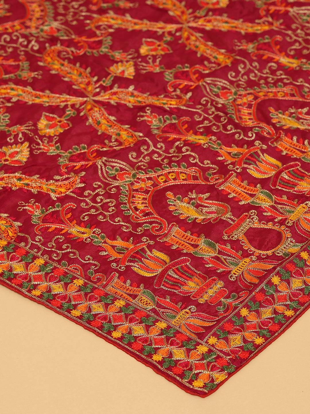 Close-up of threadwork on wine colour pashmina dupatta