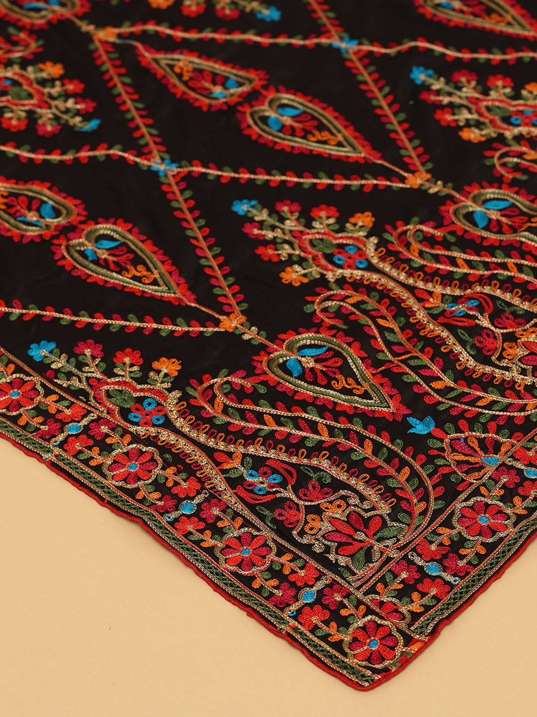 Close-up of intricate threadwork on black dupatta