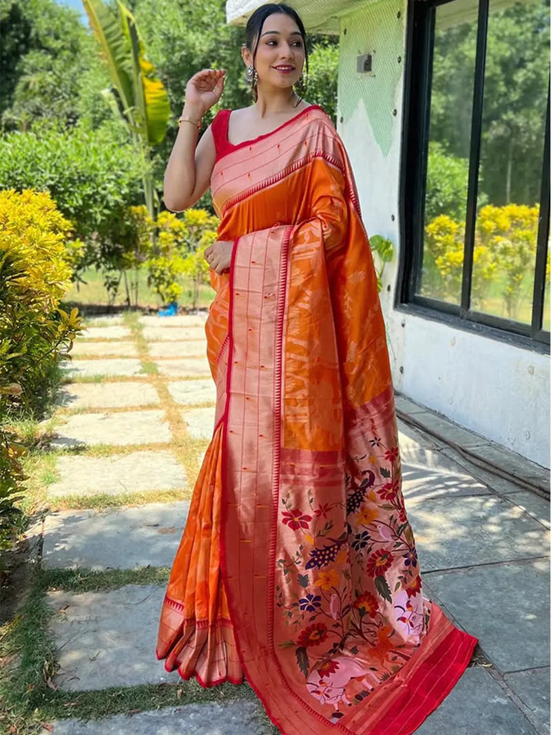 Orange Paithani silk saree with intricate Pichwai design