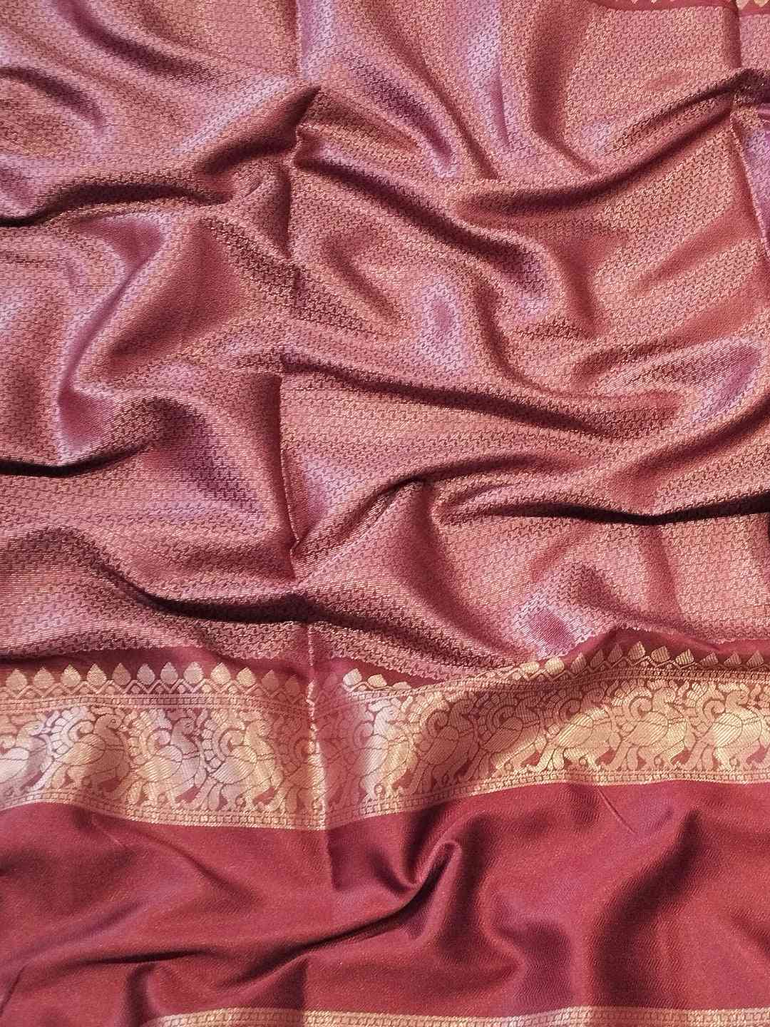 Detailed view of Banarasi silk saree fabric and border