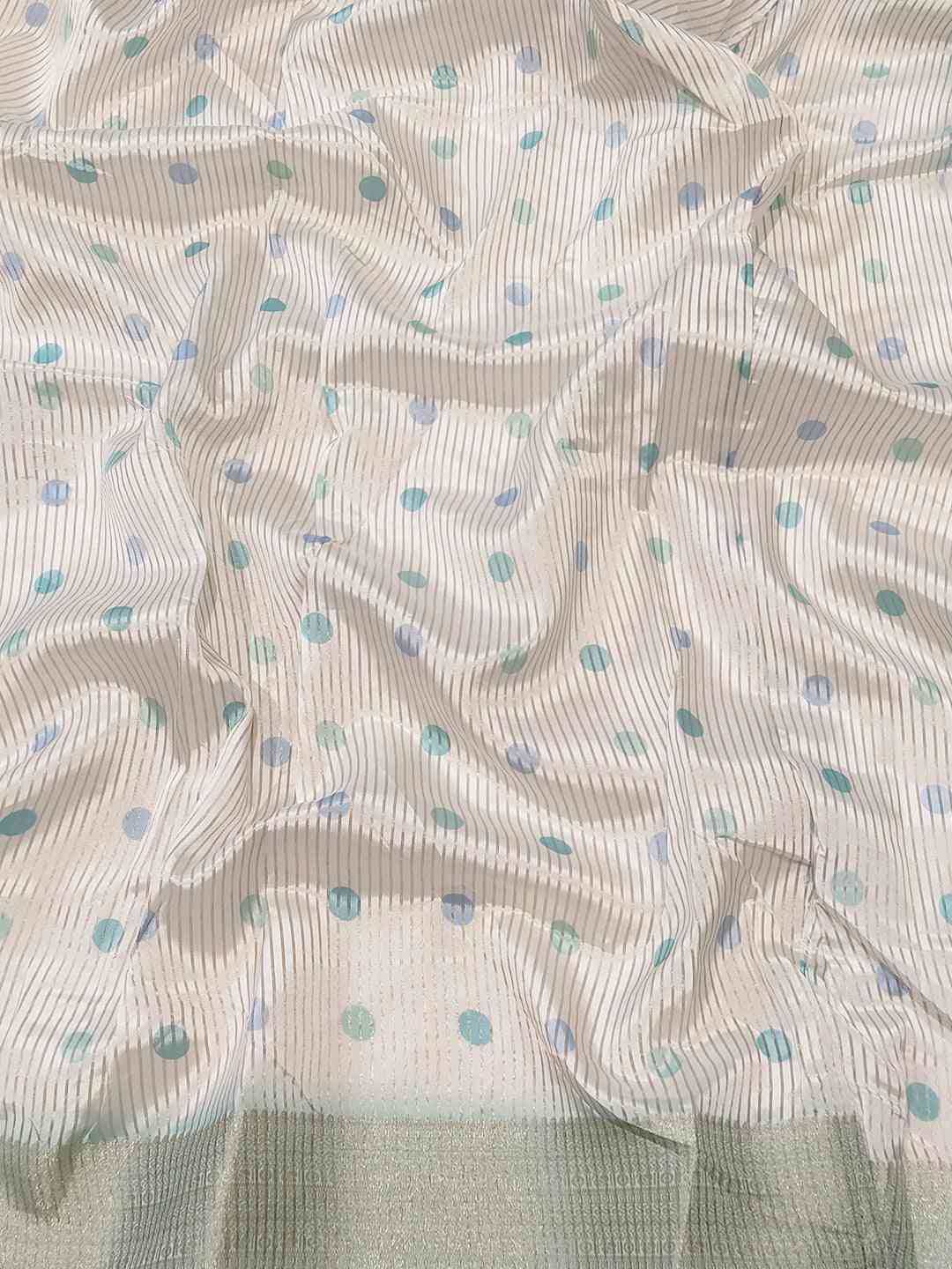 Close-up of digital print on organza saree fabric