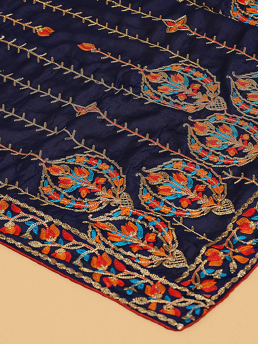 Close-up of navy chiffon dupatta with colorful embroidered motifs.