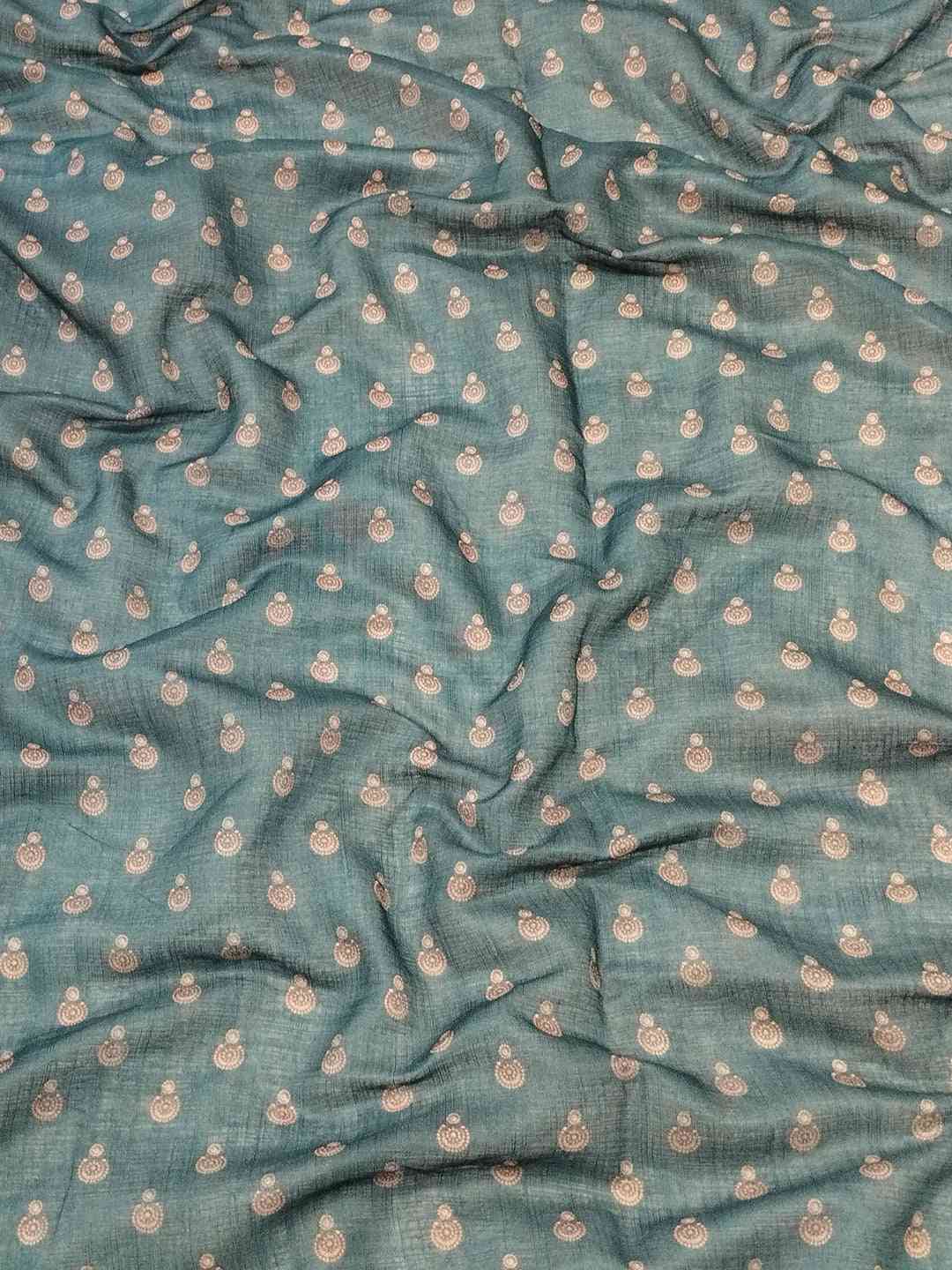 Close-up of turquoise linen fabric with subtle digital print