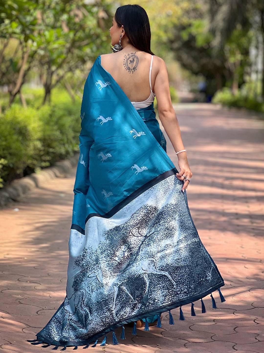 Back view of Rama soft silk saree with intricate pallu design