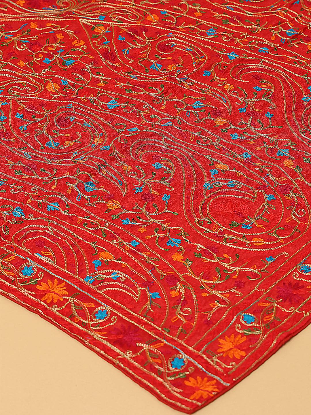 Close-up of red poly chiffon dupatta with intricate threadwork