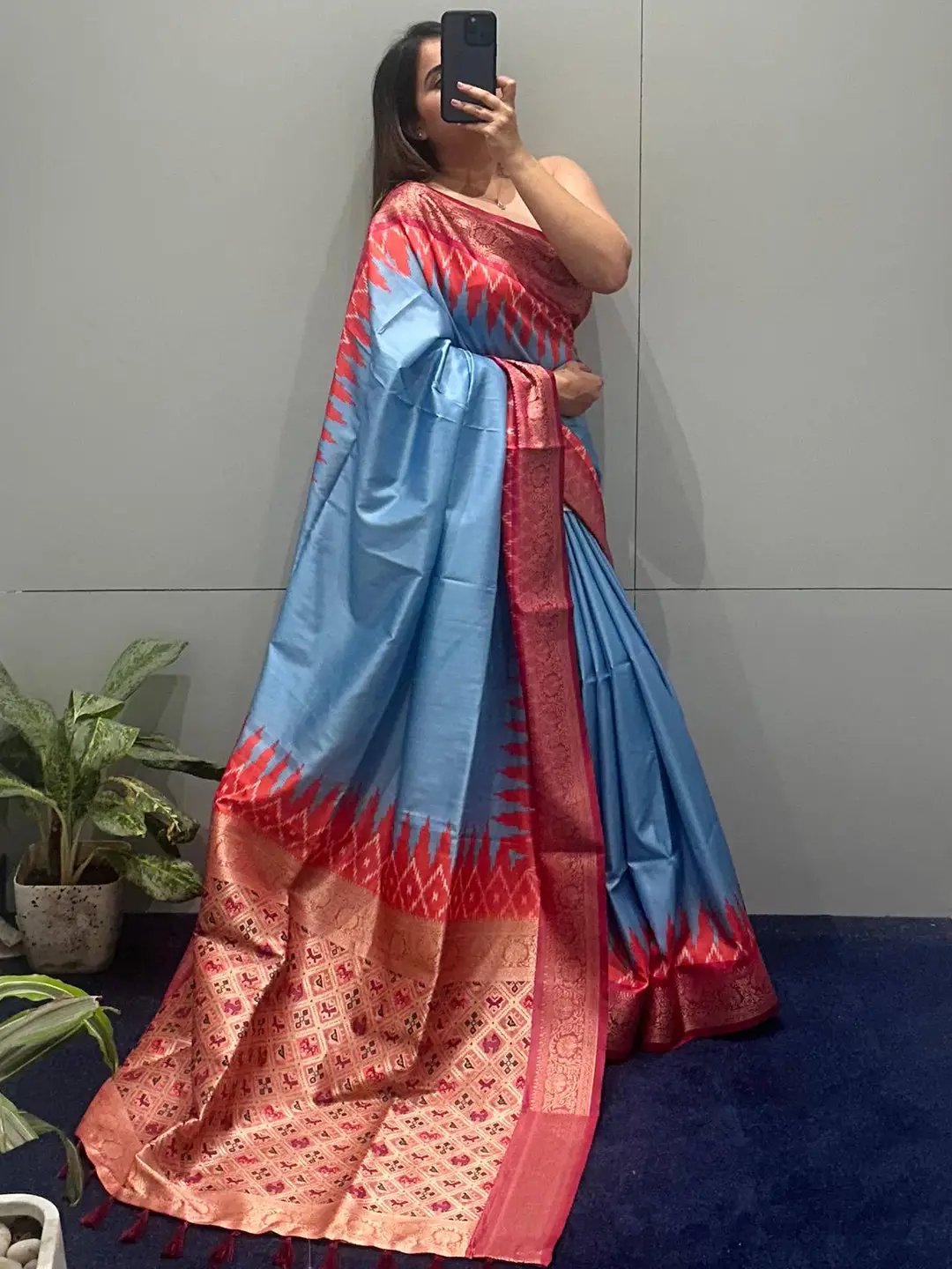 Blue Banarasi silk saree featuring red jacquard weaving