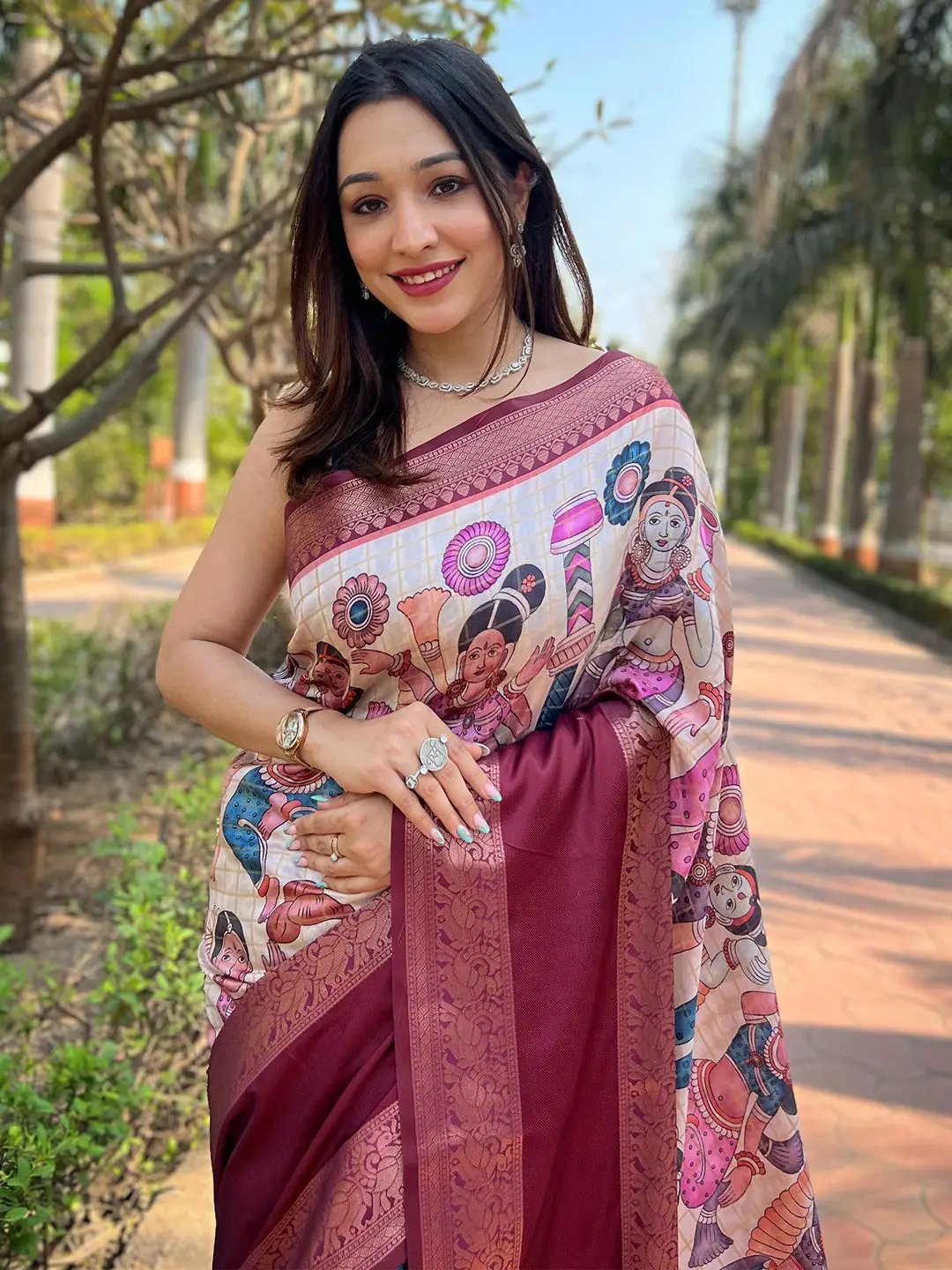 Smiling woman wearing a Banarasi silk saree outdoors