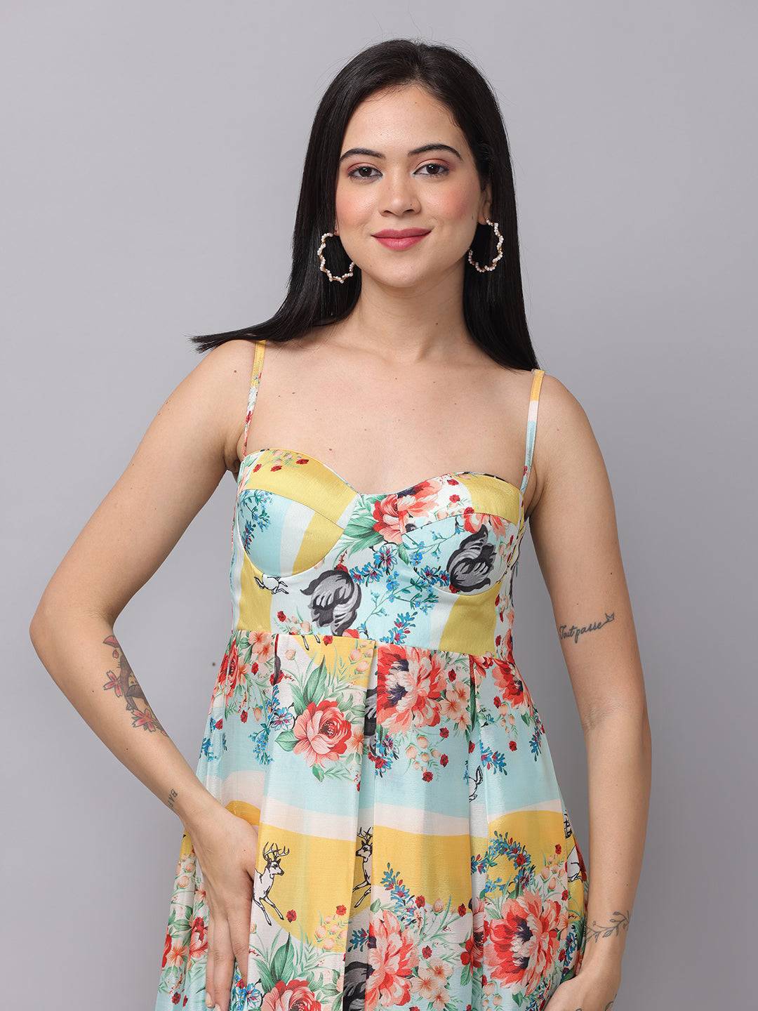 Close-up of chiffon print sleeveless dress with floral design