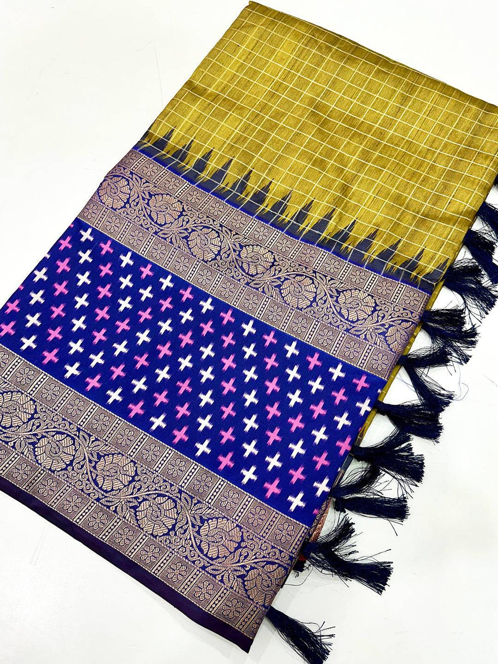 Folded Green Chex Ikkat Saree showcasing design details