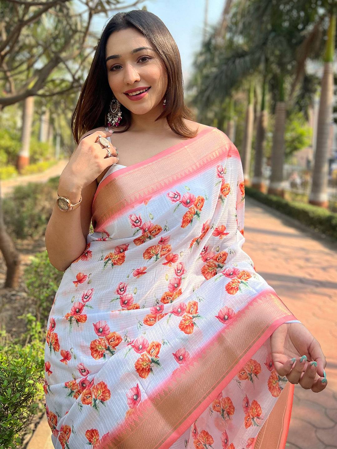 Model wearing Gajari Kota saree with floral pattern