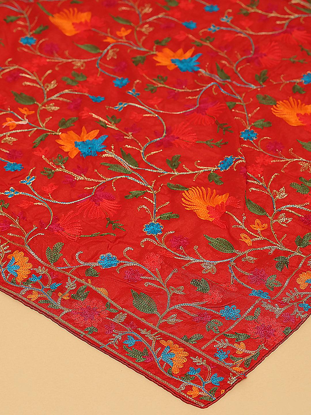 Close-up of red Bollywood poly chiffon pashmina threadwork.