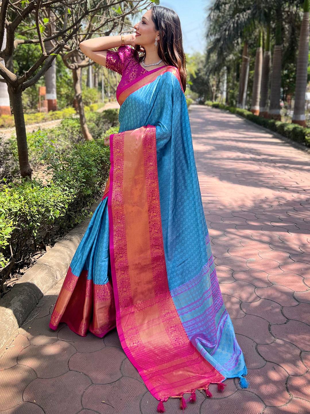 Elegant royal blue Kanjivaram saree with pink and gold border