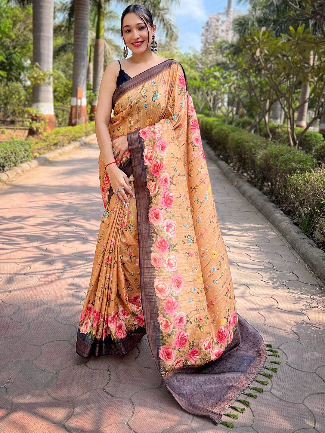 Orange silk saree with copper zari and floral design