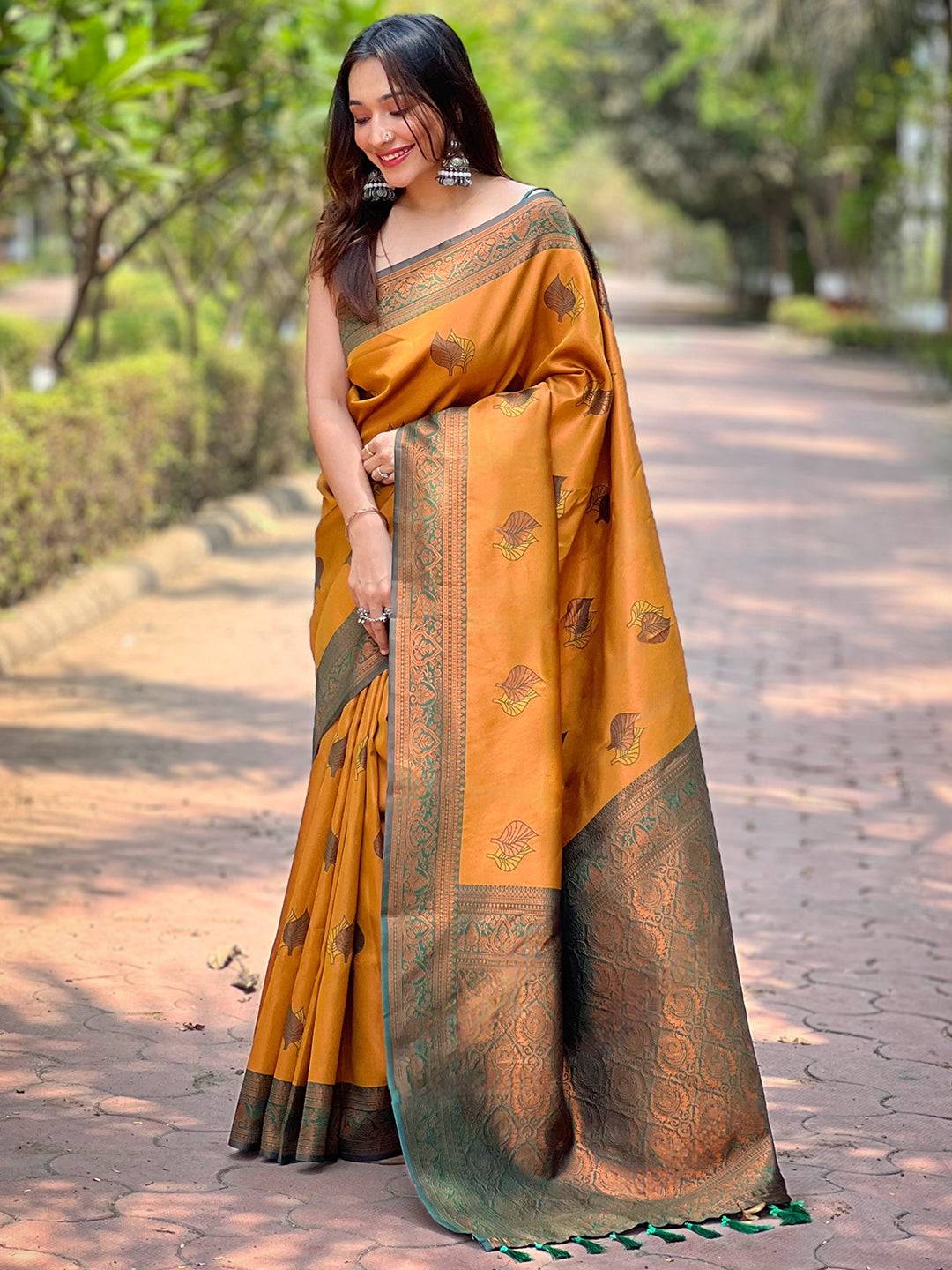 Elegant butterscotch Kanjivaram saree with intricate gold zari