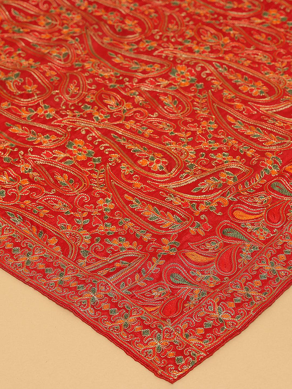Close-up of intricate threadwork on red pashmina dupatta