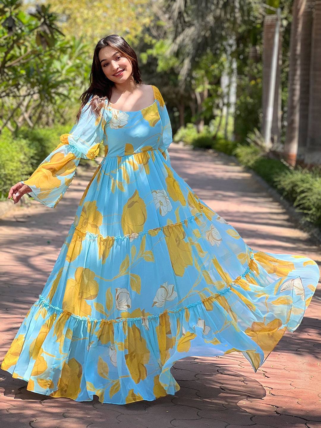 Elegant Sky Blue Floral Dress twirling outdoors
