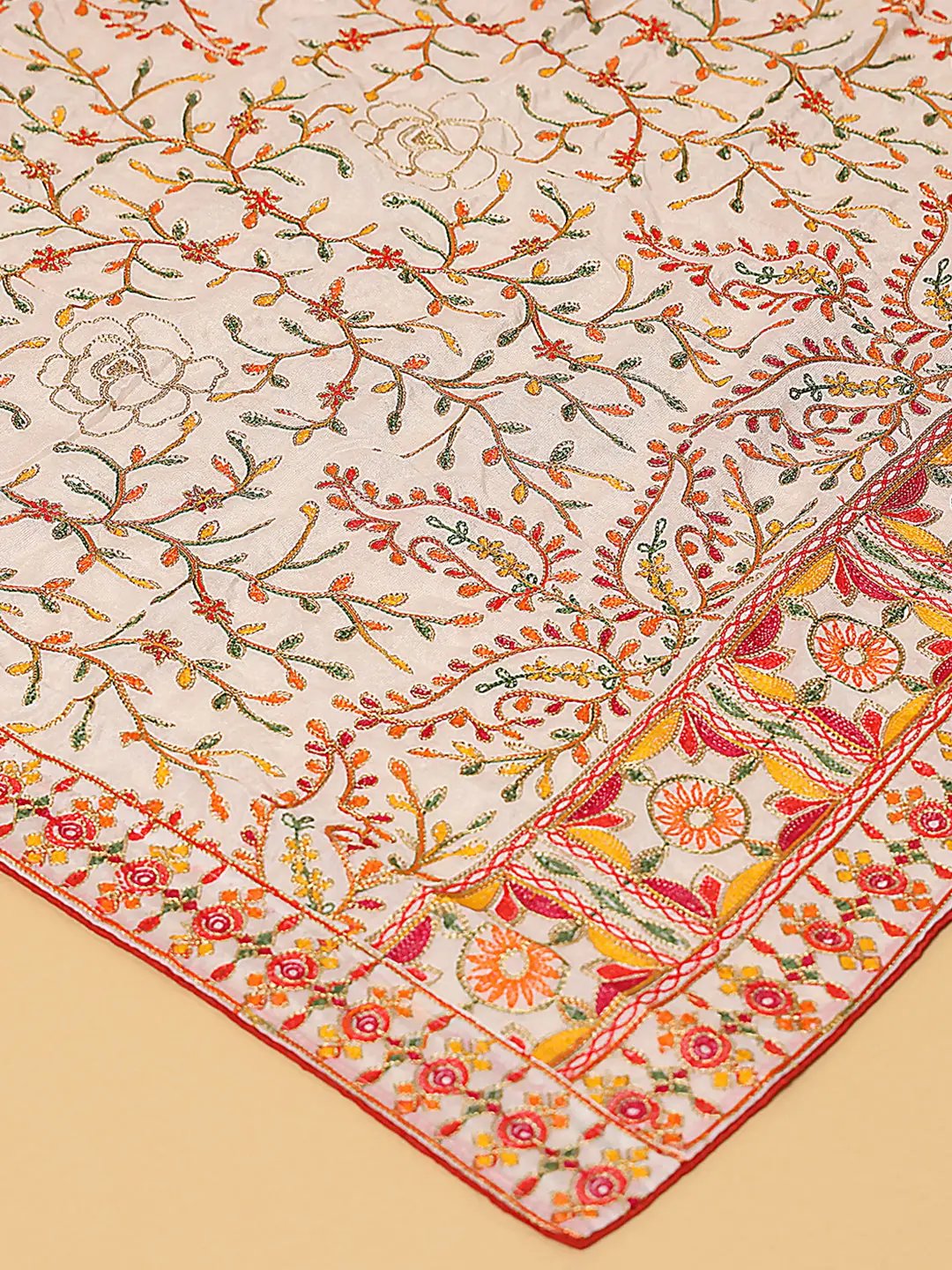 Close-up of detailed resham thread embroidery on dupatta
