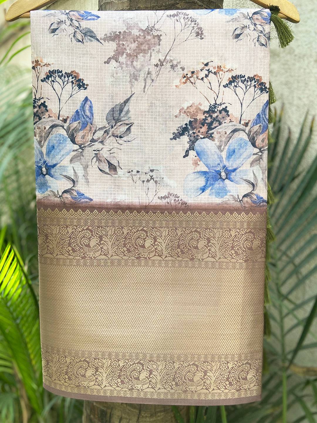 Light pink Kota Doriya saree with floral print and gold zari border