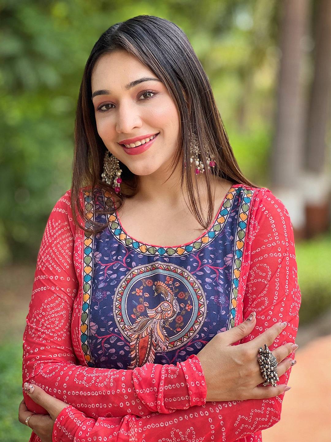 Close-up of Cherry Red Bandhej Dress with Pen Kalamkari