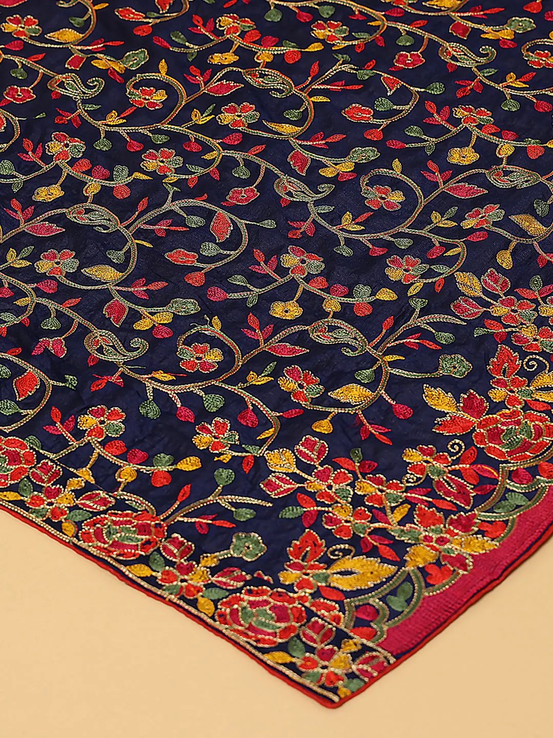 Close-up of navy chiffon dupatta with vibrant embroidery