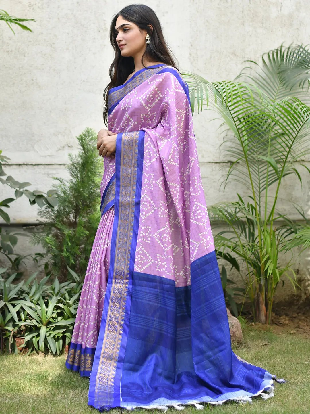 Elegant Bandhej print saree with blue Kanjivaaram border.