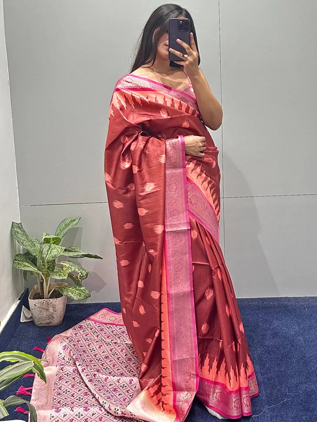 Model showcasing soft silk Banarasi saree with zari patola pallu.