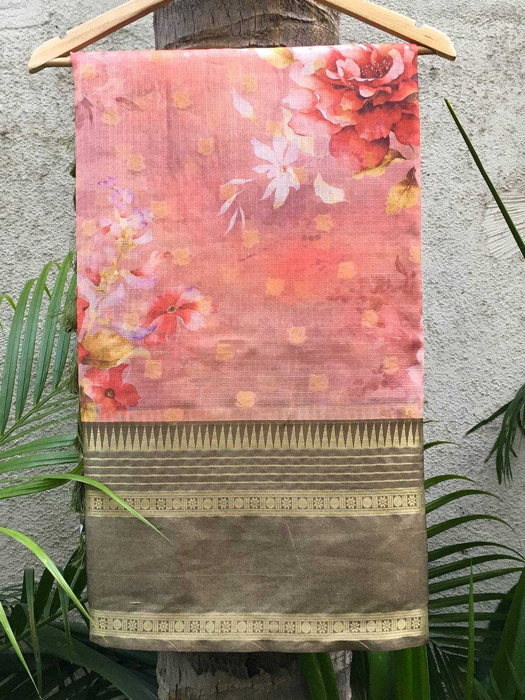 Kota Doriya coral floral printed saree on hanger