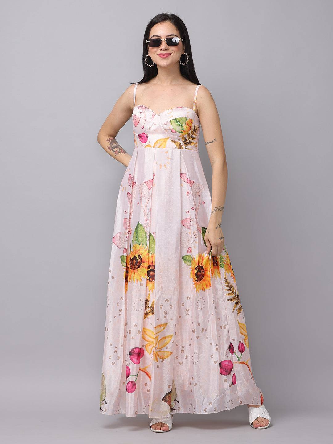 Model in floral chiffon dress with sunglasses, front view