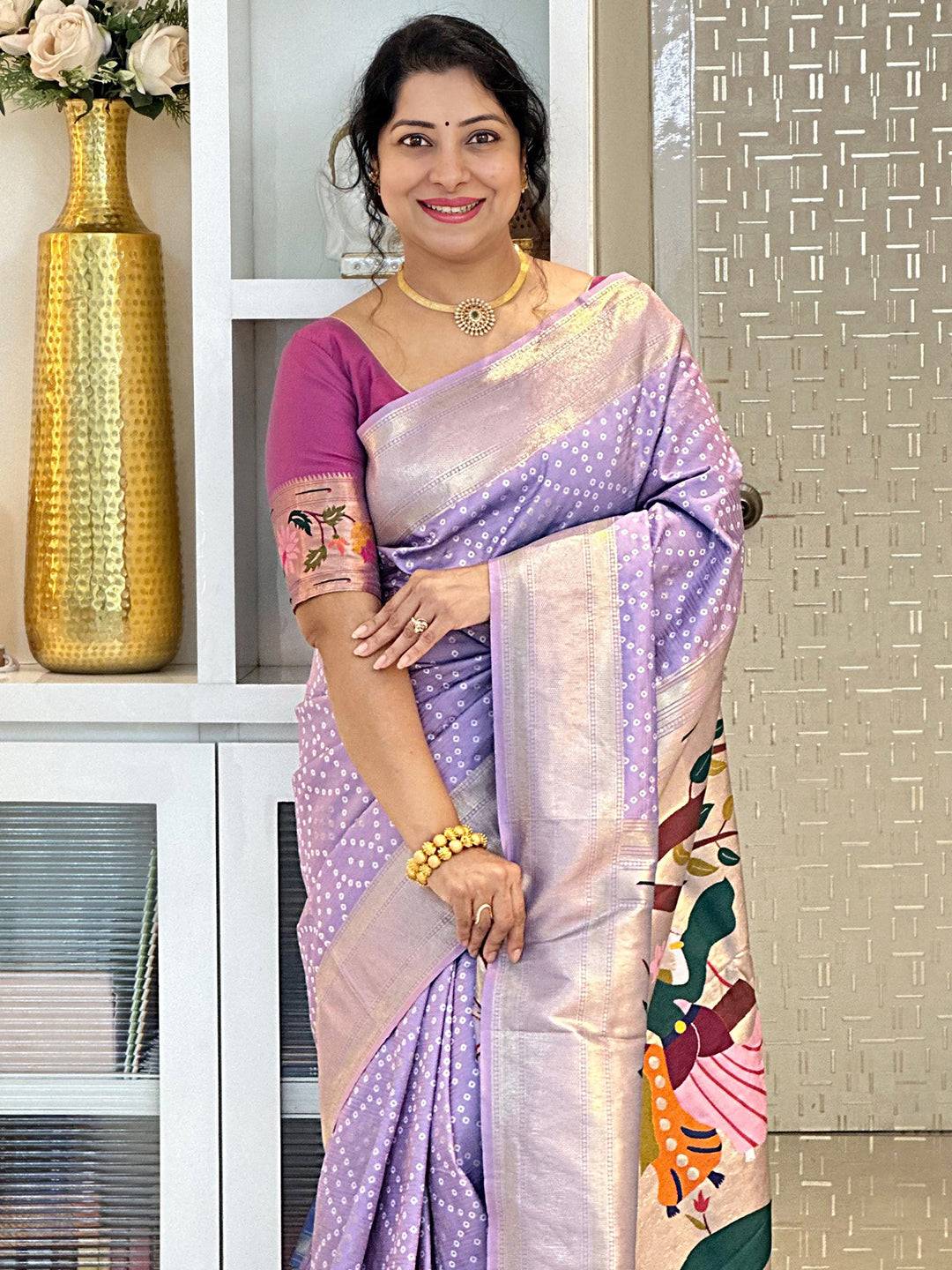 Elegant lavender Bandhej silk saree with detailed patterns.