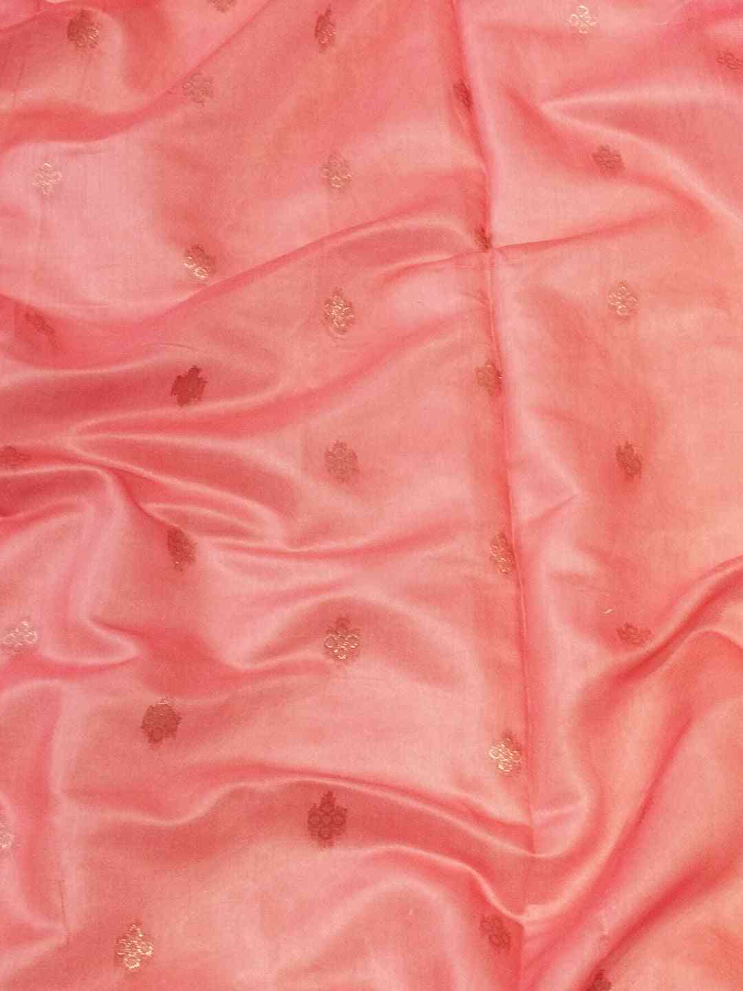 Soft pink slub silk fabric with delicate zari motifs
